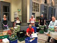 Inverclyde Council staff volunteer to sort and distribute two tonnes of food to community groups supporting vulnerable people